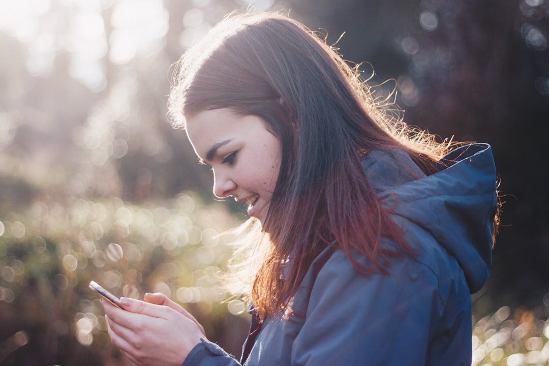 teenager using smartphone